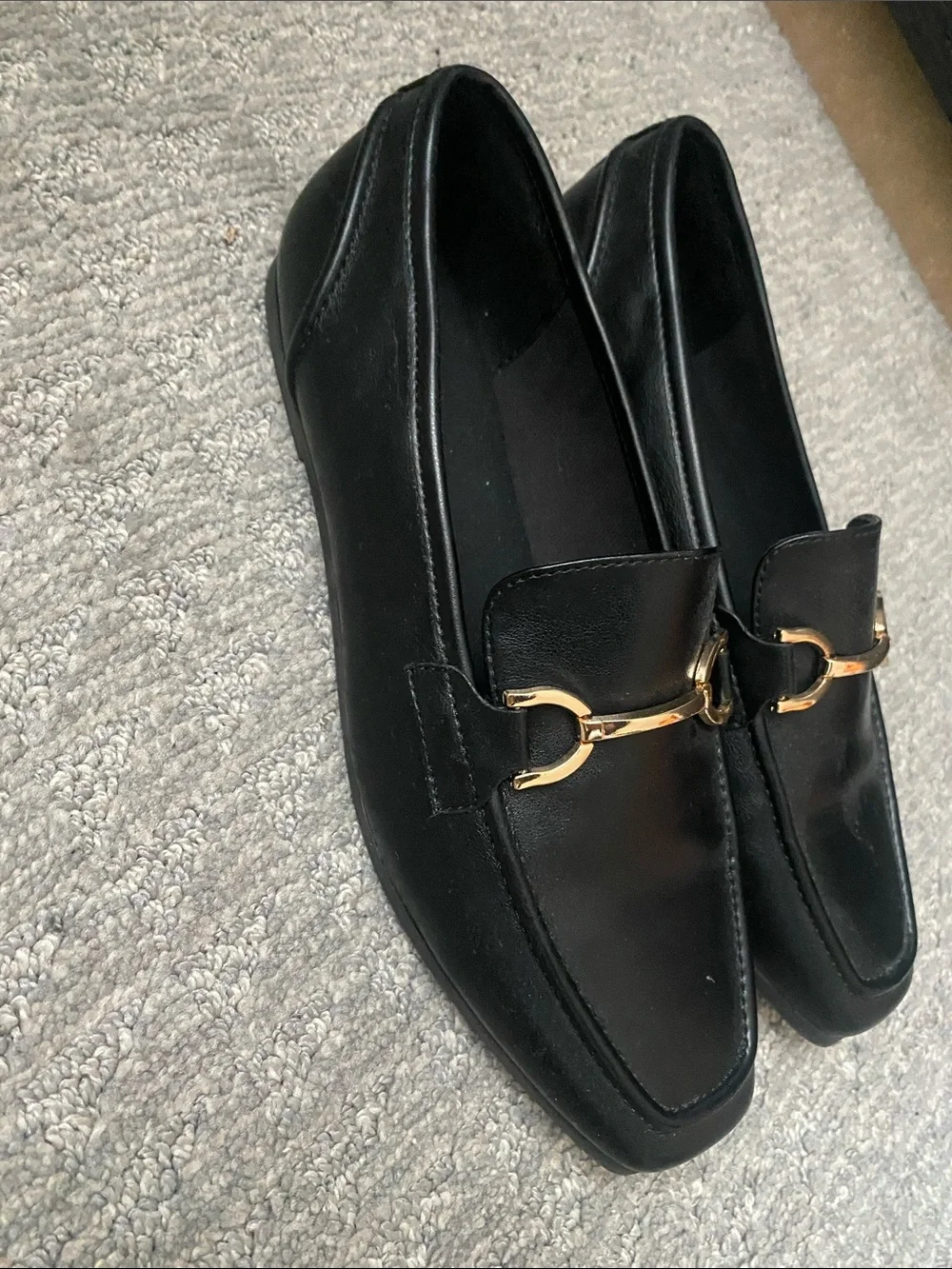 Cushionare Black Leather Slip-On Loafers with Gold Horsebit